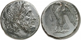 GRÈCE ANTIQUE
Royaume lagide, Ptolémée II (285-246 av. J.C.). Æ . Bronze.
Av. Tête diadémée de Zeus-Ammon à droite. Rv. (PTOLEMAIOU) BASILEWS, aigle...