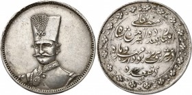 IRAN
Nasseredin Shah (1848-1896). 10 Tomans Ier type 1311 (1894), frappe en argent.
Av. Buste de trois-quarts. Rv. Inscriptions sur quatre lignes. F...