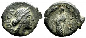Galia. Volcae-Aeromici. AE 14. 77-44 BC. (Lt-2672). Anv.: Diademed head of Artemise right. Rev.: Male figure on the left, before palm tree. Ae. 1,60 g...