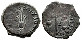 Carthage Nova. Augustus period. Half unit. 27 BC - 14 AD. Cartagena (Murcia). (Abh-585). Anv.: Lotus flower. Rev.: Pontifical implements. Ae. 5,10 g. ...
