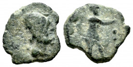 Monetiform coinage. Half unit. 1st century B.C. (Abh-M17). Anv.: Vulcano head bust right, pincers behind. Rev.: Miner with shovel to right, three dots...