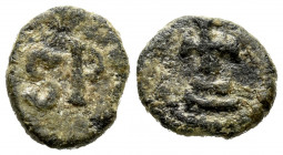 Nummus. Second half of the 7th century AD. Ispali (Sevilla). (Crusafont-Group A, type 1). Anv.: SP. Rev.: Latin cross on double tier. Ae. 0,54 g. Scar...