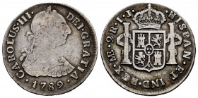 Charles III (1759-1788). 2 reales. 1789. Lima. IJ. (Cal-605). Ag. 6,47 g. Posthumous issue. Choice F. Est...40,00. 

Spanish Description: Carlos III...