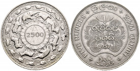 Ceylan. 5 rupees. 1957. (Km-126). Ae. 28,19 g. 2500th Anniversary of Buddhism. Knock on edge and graffiti on reverse. AU. Est...30,00. 

Spanish Des...