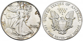 United States. 1 dollar. 1986. (Km-273). Ag. 31,49 g. "American Silver Eagle" (Bullion Coin). Mint state. Est...30,00. 

Spanish Description: Estado...