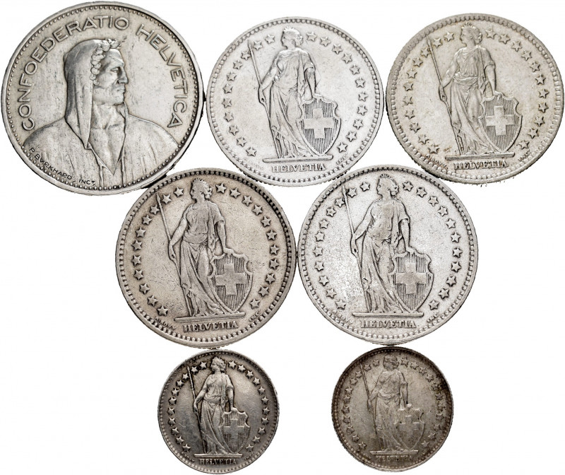 Lot of 7 Swiss coins. Variety of values and dates. Ag. TO EXAMINE. Almost VF/Cho...