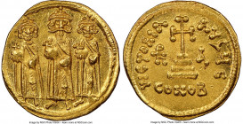 Heraclius (AD 610-641), with Heraclius Constantine and Heraclonas. AV solidus (19mm, 4.48 gm, 7h). NGC Choice MS 5/5 - 4/5. Constantinople, 5th offici...