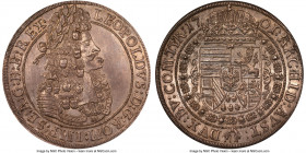 Leopold I Taler 1701 MS62 NGC, Hall mint, KM1303.4, Dav-1003. A fine example of this popular Leopold I "Hogmouth" Taler issue, featuring rich and natu...