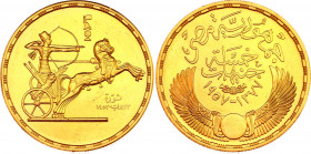 Egypt 5 Pounds 1957 AH1375
KM# 388; 5th anniversary of the Revolution. Gold (.900), 42.5g. UNC.