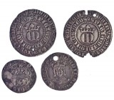 4 monedas de plata. Enrique II, real de Sevilla con agujeros (2); Enrique IV, 1/2 real de Segovia; Fernando el Católico, 1/2 real de Zaragoza. Tres pe...