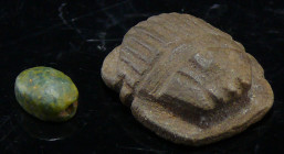 Egypte - Basse époque - Lot de 2 scarabées en pierre - 664 - 332 av. J.-C. (26ème-30ème dynastie)
Lot de 2 scarabées en pierre. Un grand de couleur m...
