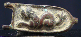 Hellénistique - Boucle de ceinture en bronze - 400 / 300 av. J.-C.
Boucle de ceinture (sans le hardillon) en bronze avec en médaillon la représentati...