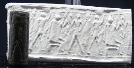 Néo-babylonien - Sceau cylindre en pierre (personnages debouts) - 1900 / 1600 av. J.-C.
Sceau cylindre en pierre dont l'empreinte représente des pers...