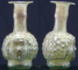 Romain - Flacon en verre (grappe de raisins) - 100 / 300 av. J.-C.
Très beau flacon en verre à panse en forme de grappe de raisins, au col long à bor...