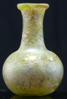 Romain - Flacon en verre irisé - 100 / 300 av. J.-C.
Beau flacon en verre irisé à panse globulaire , à col large à bord évasé. Très belle irisation n...
