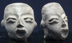 Précolombien - Mexique - Tête en terre cuite - 1200 av. / 200 ap. J.-C.
Petite tête en terre cuite noire. Le visage est encadré par un large front et...