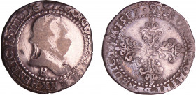Henri III (1574-1589) - Demi-franc au col plat - 1587 B (Rouen)
A/ + HENRICVS. III. D. G. (chapeau d'épine avec des clous) FRANCOR. ET. POL. REX Bust...