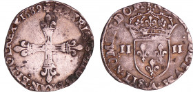 Henri III (1574-1589) - Quart d'écu - 1589 A (Paris).
A/ + HENRICVS III D G FRAN ET POL REX (millésime). Croix fleurdelisée.
R/ + SIT NOMEN DOMINI B...