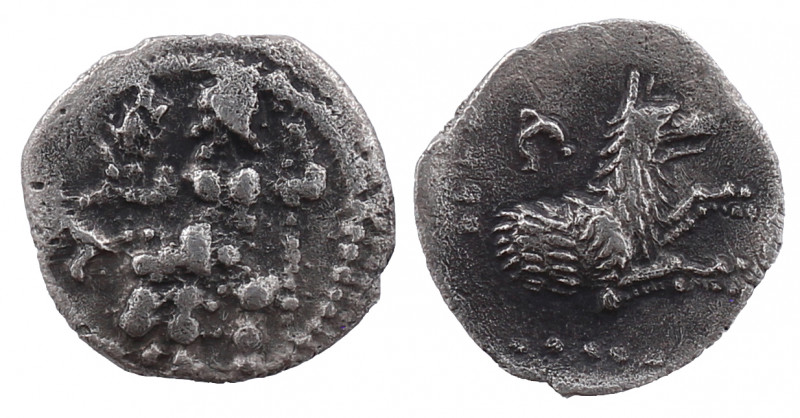 LYCAONIA. Laranda. Circa 324/3 BC. Obol. 

Obv: Baaltars seated to left, holding...