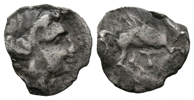 EMPORION (Ampurias, Gerona). Hemitrietartemorion. (Ar. 0,20g/9mm). 200-110 a.C. ...