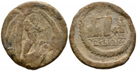 F. PEDIANS. Plomo monetiforme. (Pb. 88,27g/45mm). Siglo I a.C.-Siglo I d.C. (CCP-1). Anv: Hércules de pie con clava y piel de león, dirigendo a Can Ce...