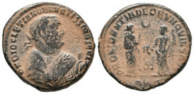 DIOCLECIANO. Follis. (Ae. 6,59g/22mm). 310-311 d.C. Antioquía. (RIC 149). Anv: Busto laureado, drapeado y con coraza a derecha portando rama de olivo ...