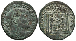 MAJENCIO. Follis. (Ae. 6,82g/27mm). 309-310 d.C. Aquileia. (RIC 121a). Anv: Cabeza laureada de Majencio a derecha, alrededor leyenda: IMP C MAXENTIVS ...