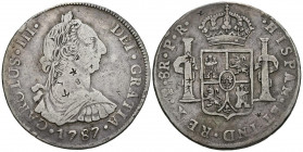 CARLOS III (1759-1788). 8 reales (Ar. 26,65g/42mm). 1787. Potosí PR. (Cal-2019-1193). BC+. Presenta algunos resellos orientales.