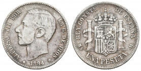 ALFONSO XII (1874-1885). 1 Peseta. (Ar. 4,88g/23mm). 1884 *18-84. Madrid MSM. (Cal-2019-23). BC+. Rara.