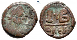 Justinian I AD 527-565. Alexandria. 12 Nummi Æ