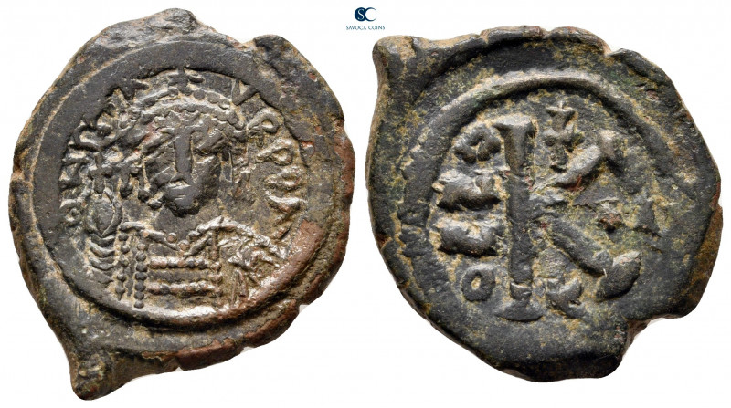 Maurice Tiberius AD 582-602. Thessalonica
Half Follis or 20 Nummi Æ

27 mm, 7...
