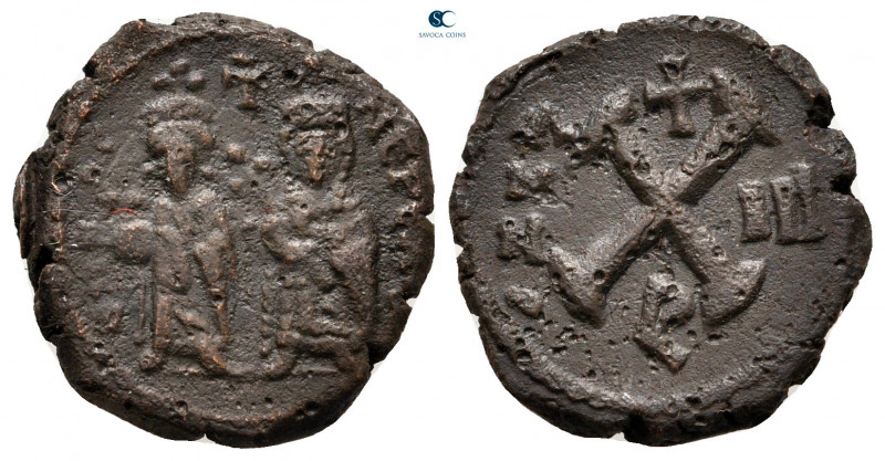 Phocas, with Leontia AD 602-610. Theoupolis (Antioch)
Decanummium Æ

17 mm, 3...