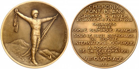 Jeux Olympiques. Premiers Jeux Olympiques d'Hiver, Chamonix 1924. Médaille en bronze, par Raoul Bénard, Paris. Athlète victorieux debout à droite, bra...