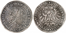 Uri, Schwyz et Unterwald. Taler 1562/1561, Altdorf. Armoiries des trois cantons réunies par la pointe. Lis stylisés dans les champs / Aigle bicéphale ...