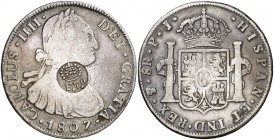 Resello (falso) F7º bajo corona sobre 8 reales de Potosí PJ de 1807. (Kr. 49). 26,59 g. Rara. MBC-.
