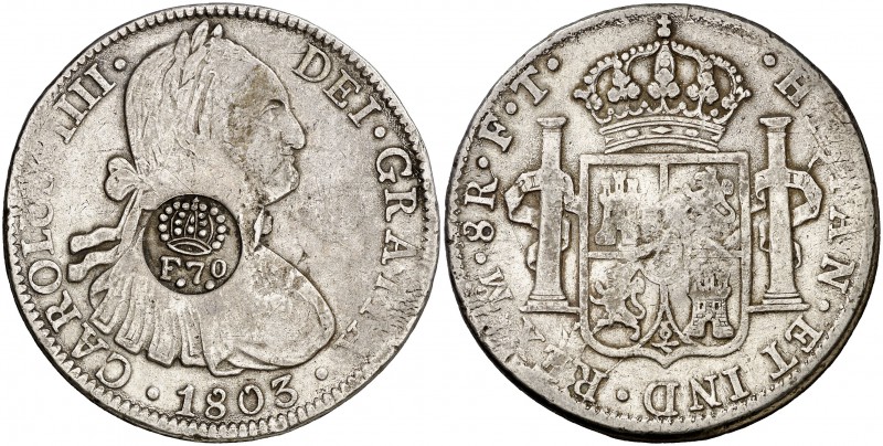 Resello (falso) F7º bajo corona sobre 8 reales de México FT de 1803. 26,56 g. MB...