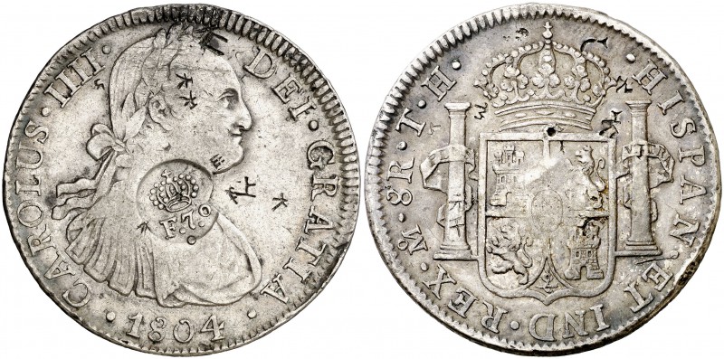 Resello F7º bajo corona sobre 8 reales de México TH de 1804. (Kr. 63). 26,86 g. ...