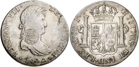 Resello (falso) F7º bajo corona sobre 8 reales de México IJ de 1820. 25,17 g. MBC.