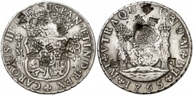 Resello F7º bajo corona, en reverso, sobre 8 reales de Lima JM de 1765, tipo columnario. (Kr. falta). 27,26 g. Resellos orientales grandes. Rara. (MBC...