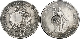 Resello F7º, bajo corona, en reverso, sobre 8 reales de Perú, Lima JM de 1826. (Kr. falta). 26 g. Rara. MBC-.