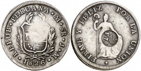 Resello F7º bajo corona, en reverso, sobre 8 reales de Perú, Lima JM de 1826. (Kr. falta). 26,65 g. Golpecitos. Rara. MBC.