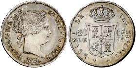 1865. Isabel II. Manila. 20 centavos. (Cal. 457) (Basso 61). 5,21 g. Brillo original y pátina irisada. Leves marquitas. Bella. Rara así. S/C-.