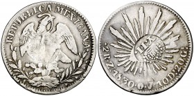 Isabel II. Resello YII bajo corona, en reverso, sobre 2 reales de México, Zacatecas OV de 1830. (Kr. 88). 5,33 g. Rara. MBC-.