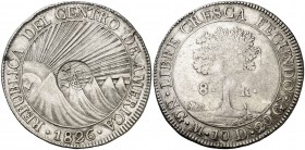 Isabel II. Resello YII bajo corona sobre 8 reales de la República del Centro de América, Guatemala M de 1826. (Kr. 106.1). 26,82 g. Rara. MBC.