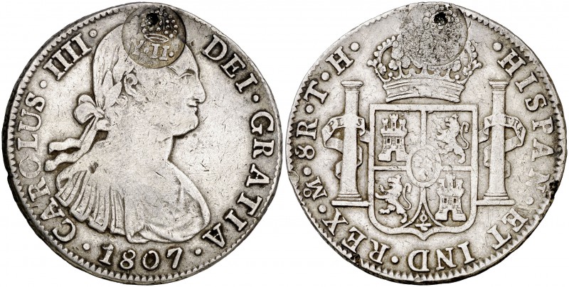 Isabel II. Resello (falso) YII bajo corona, sobre 8 reales de México TH de 1807....