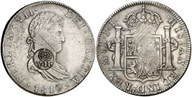 Isabel II. Resello (falso) YII bajo corona sobre 8 reales de México JJ de 1819. 26,84 g. Rayitas. MBC.