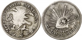 Isabel II. Resello YII bajo corona, en reverso, sobre 8 reales de México, Guanajuato JM de 1824. (Kr. 129). 26,71 g. Ex Áureo 03/03/2004, nº 1991. Rar...