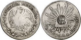 Isabel II. Resello YII bajo corona, en reverso, sobre 8 reales de México, Durango RL de 1825. (Kr. falta). 27,07 g. MBC-.