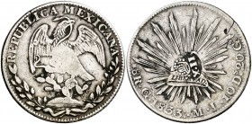 Isabel II. Resello YII bajo corona, en reverso, sobre 8 reales de México, Guanajuato MJ de 1833. (Kr. 129). 25,43 g. MBC-.