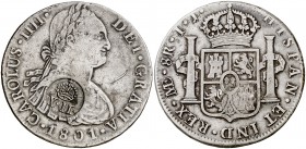 Isabel II. Resello (falso) YII bajo corona, sobre 8 reales de Lima IJ de 1801. 26,69 g. MBC.